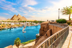 Skyline-view-of-Aswan-with-sailboats-in-the-Nile-on-the-way-to-pyramids-Egypt-scaled